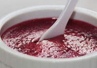 une cuillerée de confiture de framboises